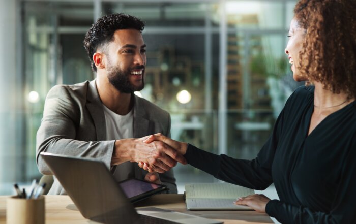 Tech Professionals shaking hands
